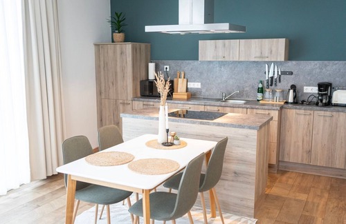 Bad Zwischenahn Apartment | SmartFewo: Windbreaker | Terrace | Sauna | Park - Residence by the small sea