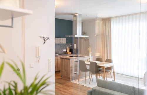 Bad Zwischenahn Apartment | SmartFewo: Windbreaker | Terrace | Sauna | Park - Residence by the small sea
