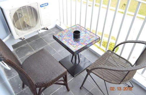 Tagaytay Apartment | SMDC Wind Residences 102 Loft Bedroom Facing Amenities with WIFI and Parking