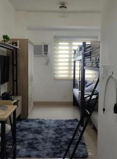Dasmarinas Apartment | SMG - Studio@Green2: Wi-fi, Netflix, Swim & Relax
