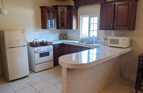 Kingston Apartment | Smile Tangerine - One Bedroom Apartment - King Bed - Secure Centrally Located