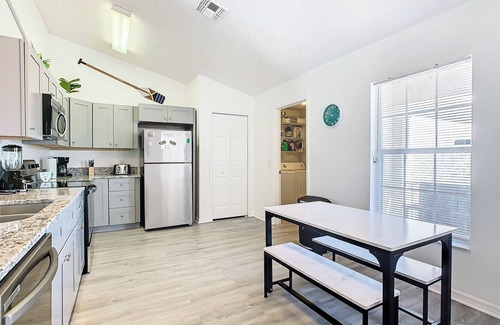 Crescent Lakes House | Smiling Disney Oasis heated pool home in Kissimmee with Game room.