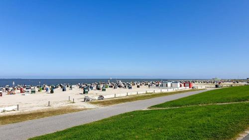 Altfunnixsiel Apartment | Smittshörn 3 - Nordsee Erdgeschosswohnung mit eingezäunten Garten, Kamin und Lounge!