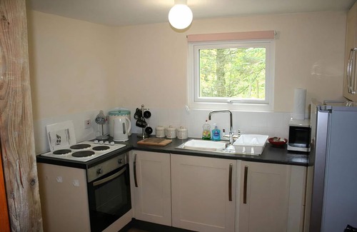 Mawr Cottage | Snow White's House - Farm Park Stay with Hot Tub, BBQ & Fire Pit