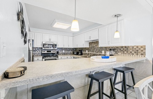 Miramar Beach Condo | Snowbird-friendly Gulf-front condo with outdoor pool & gym