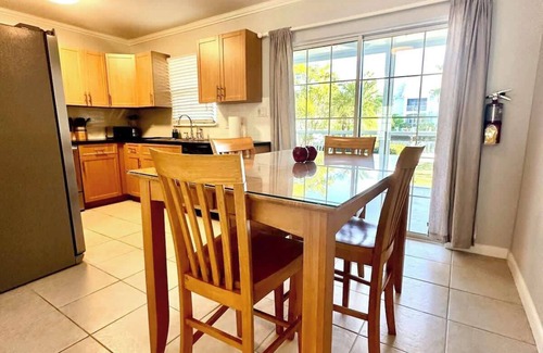 Seven Mile Beach Condo | Snug Harbour View #4 at 7 Mile Beach on Canal