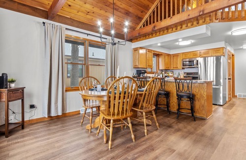 Wautoma House | Soak Up the Last Rays- Hot Tub Pier & Paddleboards