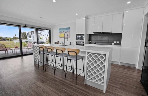Paynesville House | Soak up the sun and moor at your private jetty berth