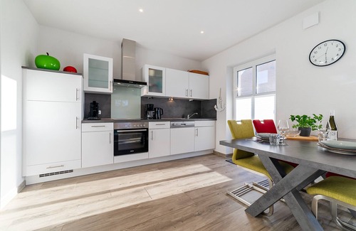 Greetsiel Apartment | Sonnenseite: Moderne Ferienwohnung für Ihren Perfekten Urlaub