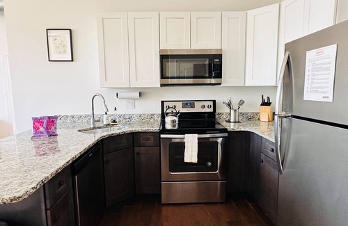 West Poplar Apartment | Sosuite 1BR Penthouse w Patio W D Gym
