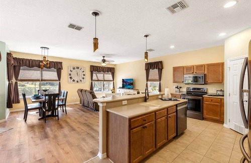 Watersong House | South facing heated pool and spa home in Watersong close to Disney attractions