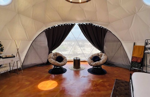 Terlingua RV Rental | Southern Boho inspired Geodesic Dome nestled up next to Big Bend National Park.