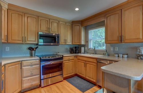 Mayhew House | Southern Comfort by SoCharm | Lakefront w/hot tub, gameroom, firepit, kayaks & half court basketball