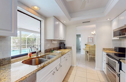 Pelican House | Southern Exposure Canal Getaway | Pool & Private Fishing Dock | Near Beach
