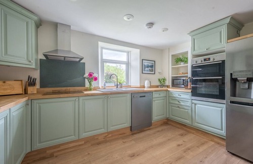 Rusland House | Space galore, an acre of gardens and four bedrooms, Lakeland farmhouse with games room, free parking