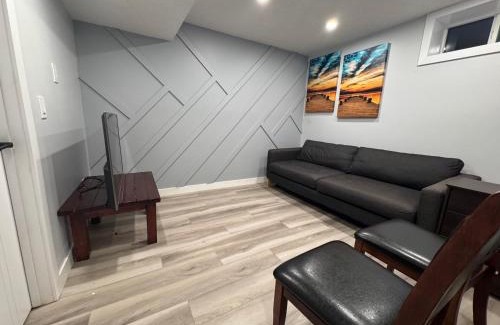 Southeast Calgary House | Spacious 2 bedroom 3 beds lower unit with separate entrance and parking space Near Downtown, Calgary Zoo, Costco and many more