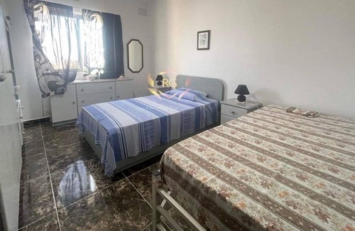 Birzebbuga Apartment | Spacious 2 bedroom, open plan apartment with a terrace (sleeps 6)