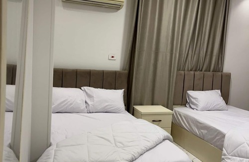 Kafrat al Jabal Apartment | Spacious 3-bedroom apartment in fantastic Giza Governorate with WiFi, AC