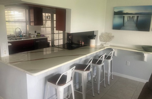 Caloosahatchee House | Spacious 3-bedroom home with backyard oasis, private heated pool, close to beach