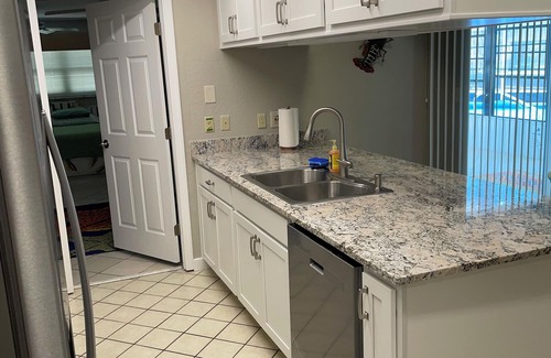 Indian Waters House | Spacious 3 BR 2 Bath House On Deep Canal With Screened Heated Pool