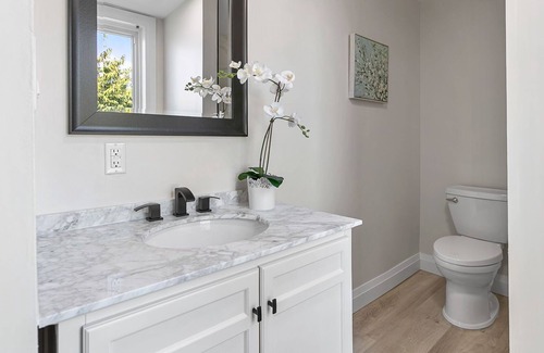 Kitchener House | Spacious 4-Bedroom home with ample parking