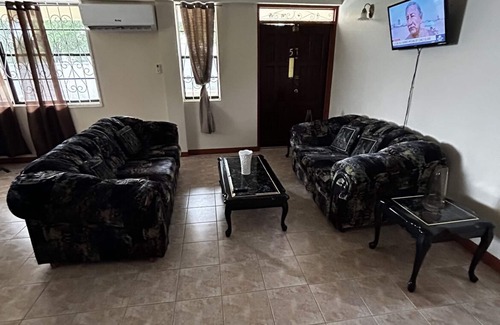 Massacre House | Spacious 4-bedroom residence featuring a ground floor apartment.