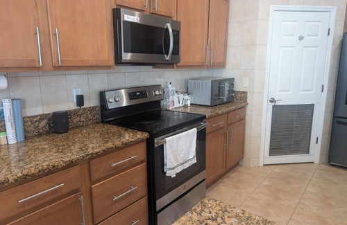Indian Trails House | Spacious 4 BR house w/Solar heated pool, Spa and Sauna in delightful Palm Coast