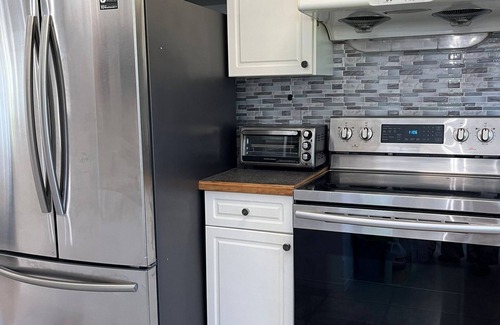 Brandon House | Spacious 4BedroomHome with Modern Amenities and ScenicViews perfect for Families