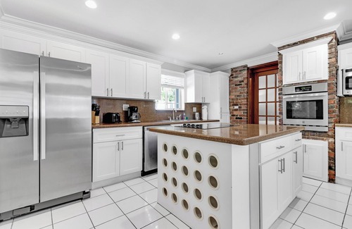 El Portal House | Spacious 5-bedroom, 2-bath home in picturesque El Portal, complete with AC