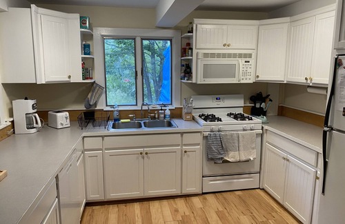 North Haven House | Spacious 5 bedroom home in town with large deck!