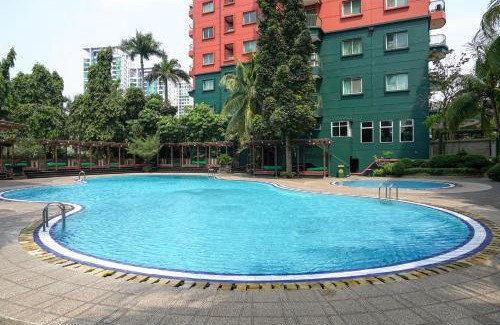 Pondok Indah Apartment | Spacious and Homey 2BR at Nuasa Hijau Pondok Indah Apartment By Travelio