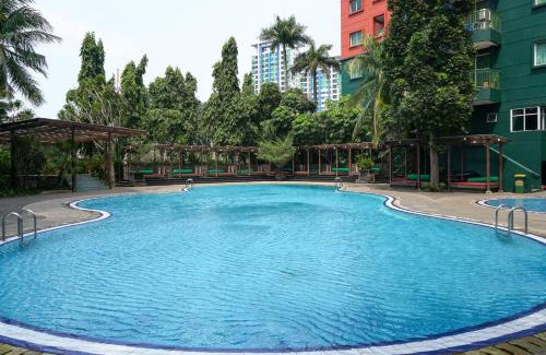 Pondok Indah Apartment | Spacious and Homey 2BR at Nuasa Hijau Pondok Indah Apartment By Travelio