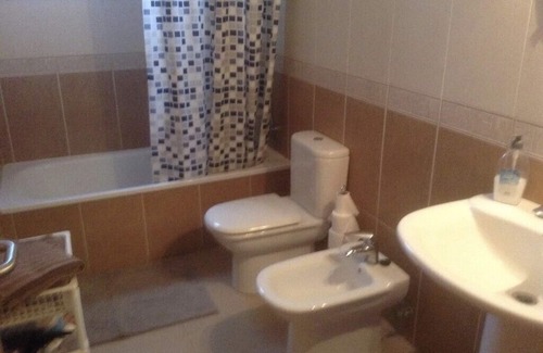 Gran Tarajal Apartment | Spacious Apartment, Panoramic Sea and Mountain Views, Gym, Pool, WiFi, Smart TV