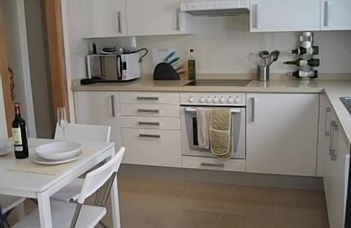 Gran Tarajal Apartment | Spacious Apartment, Panoramic Sea and Mountain Views, Gym, Pool, WiFi, Smart TV