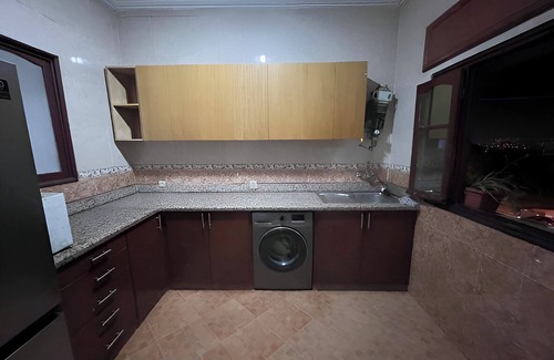 Bni Makada Apartment | Spacious apartment with Moroccan living room and garden view