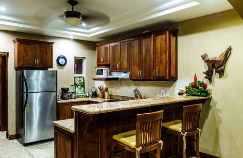 Playa Langosta Villa | Spacious beachfront 2-BR condo with Pool and a stunning sunset view