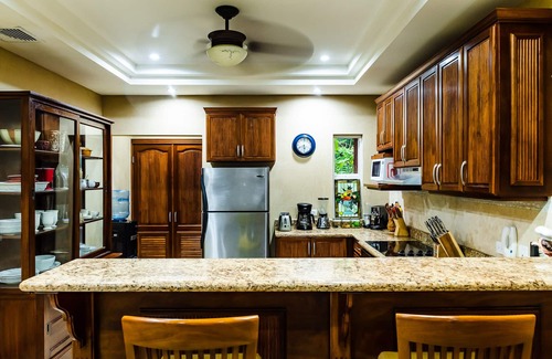 Playa Langosta Villa | Spacious beachfront 2-BR condo with Pool and a stunning sunset view