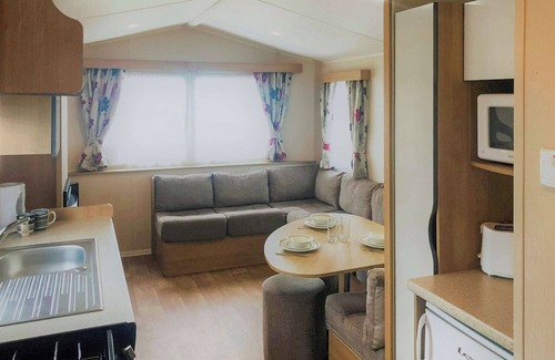 Skegness House | Spacious caravan with one double and two twin.