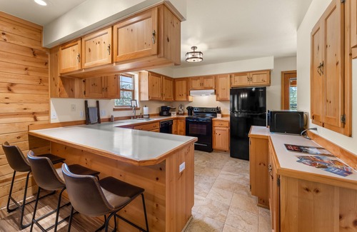Cotopaxi House | Spacious dog-friendly home with deck, Ping-Pong, foosball, fireplace, grill, W/D