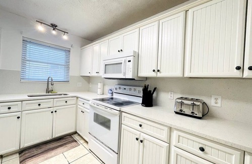 Crescent Beach House | Spacious duplex, short walk to the beach, shared Pool