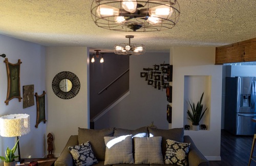 Quad Cities House | Spacious family home with luxe beds, fenced in back yard, heart of town!