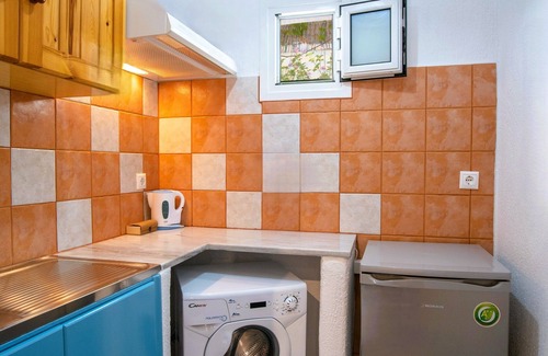 Paros Apartment | Spacious Economy Room (4-5 Adults) - Semi Basement center- near Livadia Beach.