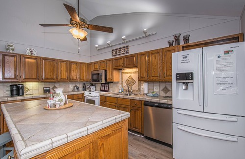 Prosperity House | Spacious grounds and home with large deck and dock in quiet cove.