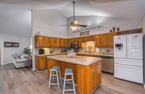 Prosperity House | Spacious grounds and home with large deck and dock in quiet cove.