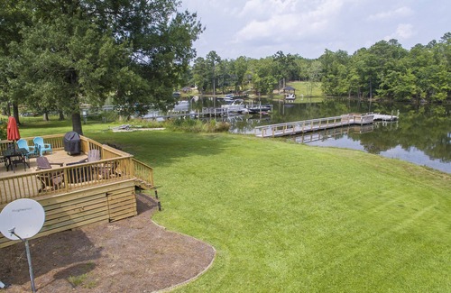 Prosperity House | Spacious grounds and home with large deck and dock in quiet cove.