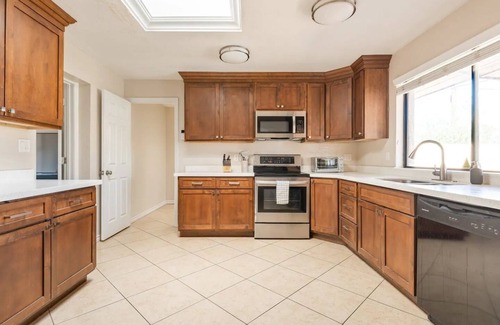Alhambra House | Spacious home! Heated pool, sundeck, and sports court