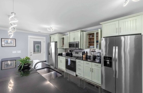 Garden City House | Spacious Home with Private Pool, Steps from the Beach & Marsh Views
