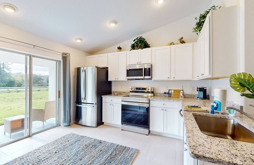 Palm Harbor House | Spacious Home with Private Patio, washer/dryer, and high-speed internet
