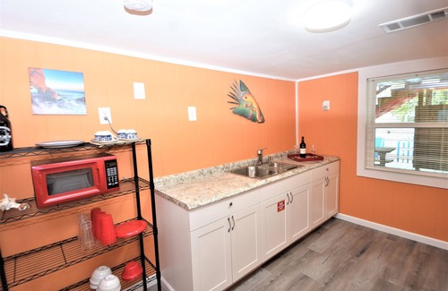 St. George Island House | Spacious house- Deep Water Dock, Pool, Game Room, Hot Tub, Fenced Yard & more!