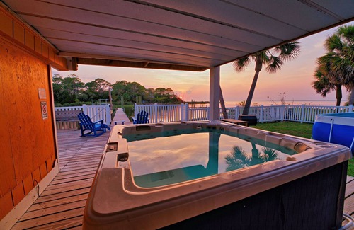 St. George Island House | Spacious house- Deep Water Dock, Pool, Game Room, Hot Tub, Fenced Yard & more!